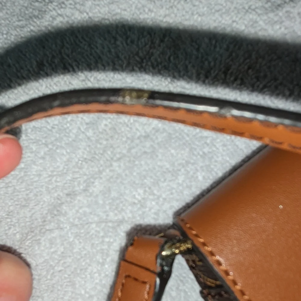 Calvin Klein brown signature Roxy crossbody bag.